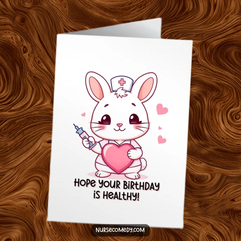 Funny Free Printable Birthday Card: A cute rabbit nurse winking, holding a syringe and heart, wishing a happy birthday.